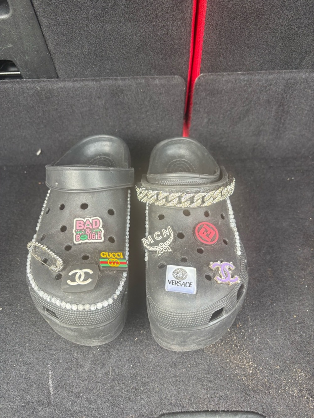 Black Embellished Platform Clogs with Decorative Charms